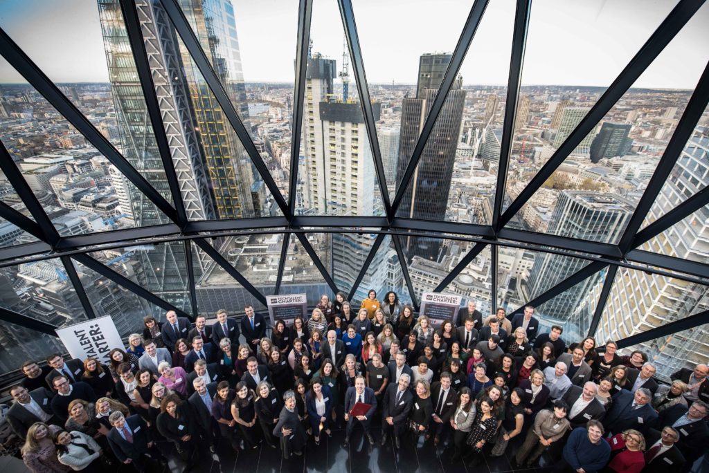 All 90 signatories of the Tech Talent Charter gather for a photo at the Gherkin
